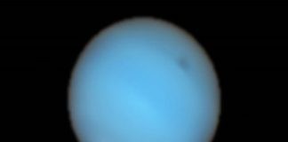 Misteriosa mancha oscura en Neptuno