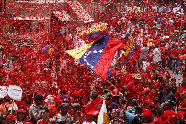 Venezuelan state employees march during a May Day parade in Caraca