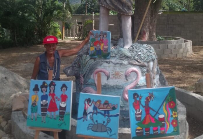 Yolanda Mijares junto a San Juan-Patanemo