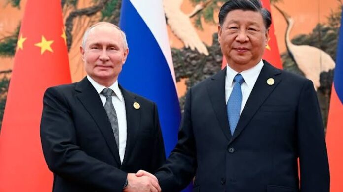 Putin y Xi Jinping Putin y Xi Jinping